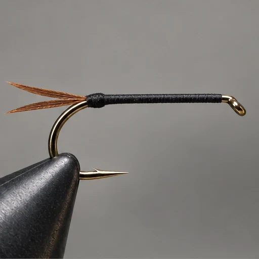 Prince Nymph, step 2: Two narrow brown tails form a rearward V.