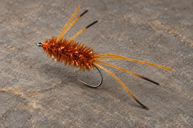 Burnt-orange Goober Bug with ice-chenille body and rubber legs